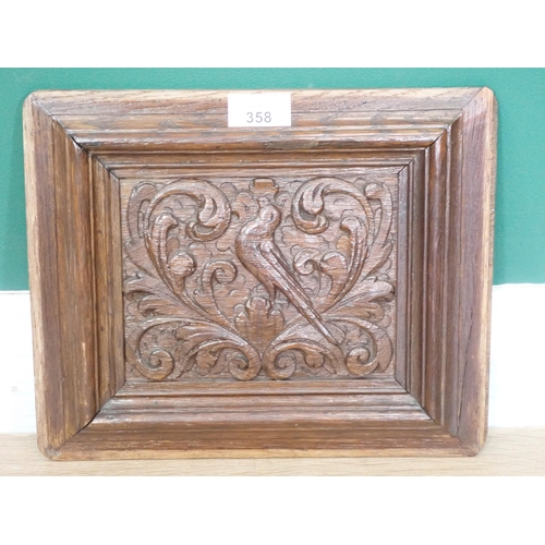 358 - A 17th Century carved oak Panel of a bird amongst scrolled foliage 12in W x 10in H