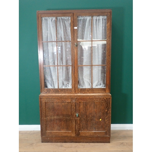 359 - A 20th Century oak and glazed Bookcase with base fitted pair of cupboard doors 6ft 6in H x 3ft 6in W