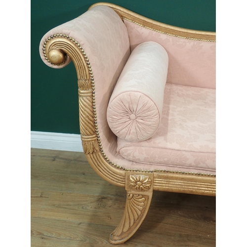 369 - A Regency style gilded Chaise Lounge with scroll arm and footboard and pink floral upholstery mounte... 