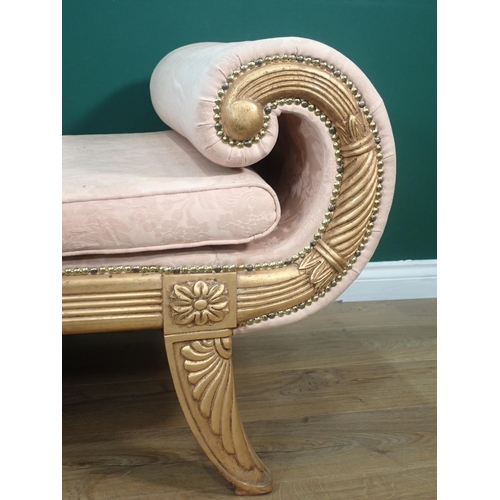 369 - A Regency style gilded Chaise Lounge with scroll arm and footboard and pink floral upholstery mounte... 