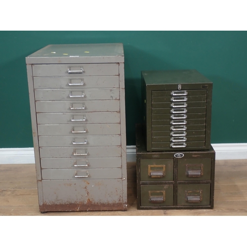 390 - Three metal Sets of drawers