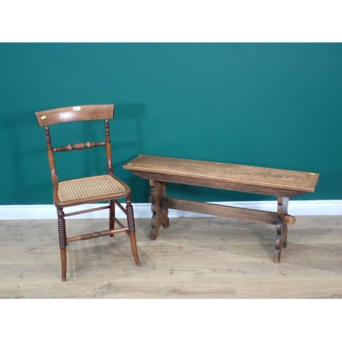 391 - A Victorian Bedroom Chair with cane seat and an oak Refectory Bench on shaped end supports