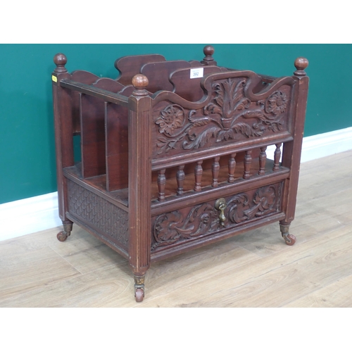 392 - A mahogany Canterbury with floral and leafage carving fitted single drawer to base 1ft 8in W x 1ft 8... 