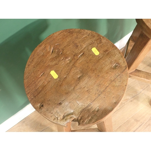 398 - A pair of rustic circular topped Stools 2ft 6in H x 11in D