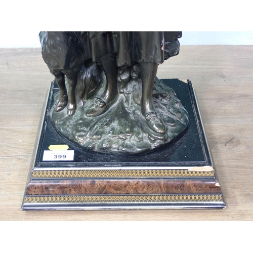 399 - A bronze effect Sculpture of a Shepherdess on walnut veneered and gilded square base 2ft H