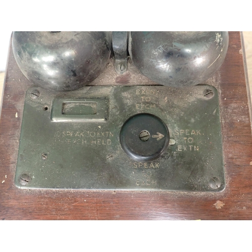 42 - A Bell Telephone and a wooden wind up Telephone