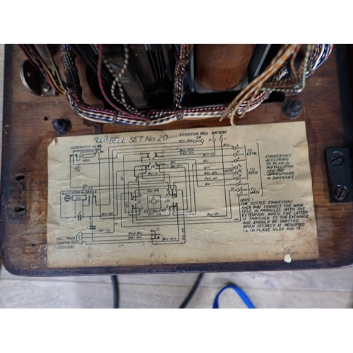 42 - A Bell Telephone and a wooden wind up Telephone