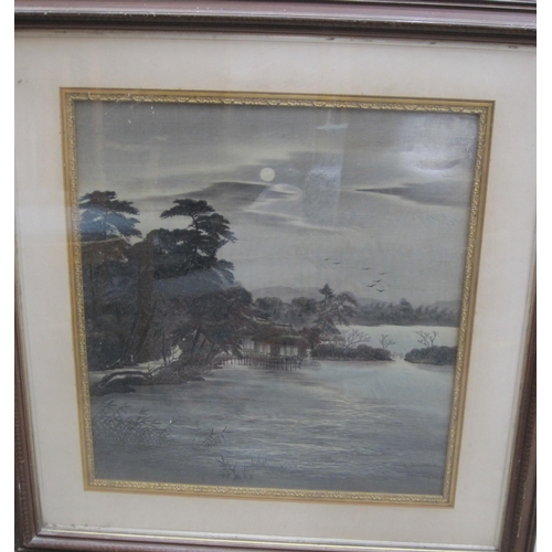 430 - A framed embroidered picture depicting an Eastern river landscape with buildings by trees, 25 x 24in