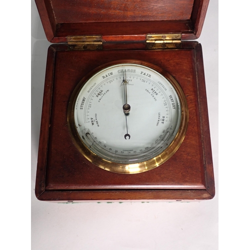 435 - A Barometer and Thermometer in mahogany case