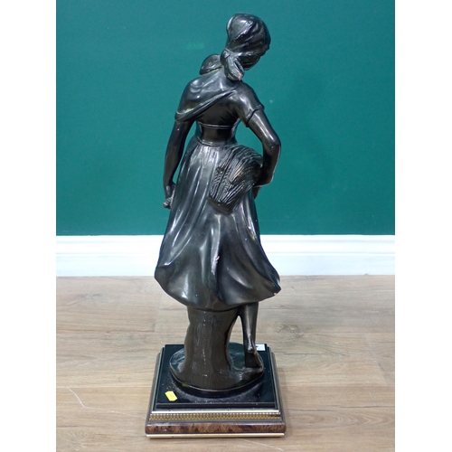 458 - A bronze effect Sculpture of a Girl harvesting wheat on ebonised and walnut effect base 2ft 1in H