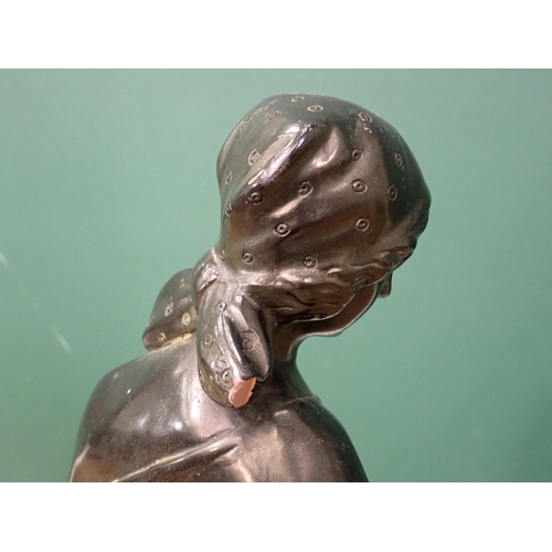 458 - A bronze effect Sculpture of a Girl harvesting wheat on ebonised and walnut effect base 2ft 1in H