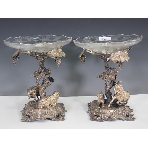 462 - A pair of Tazzas with white metal bases in the form of vines with goats and sheep and glass bowls wi... 