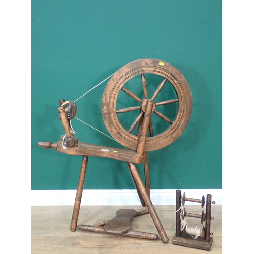 467 - An Haldane Spinning Wheel 3ft 1in H x 2ft 7in L