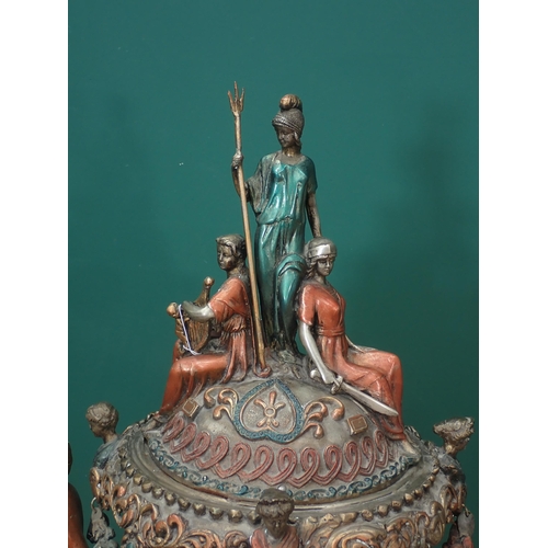 472 - A large bronze effect Urn in the Roman style with figures of gods and warriors and swag decoration 4... 