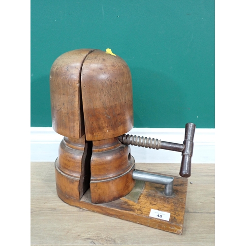 48 - An antique turned wood Milliner's Block with screw adjustable mechanism