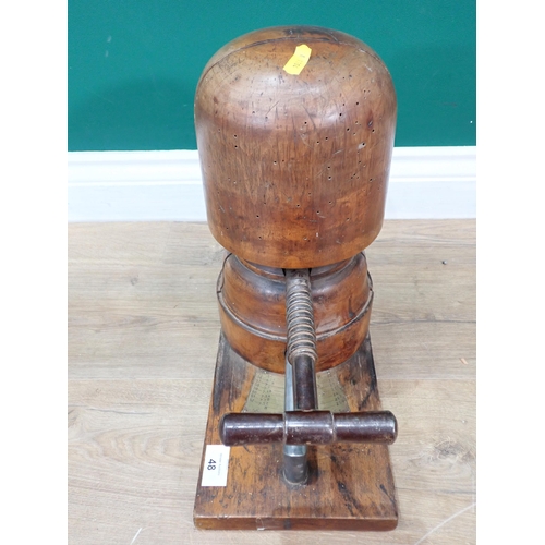 48 - An antique turned wood Milliner's Block with screw adjustable mechanism