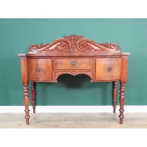 486 - A Victorian mahogany Sideboard with raised scroll carved gallery back fitted three drawers mounted o... 