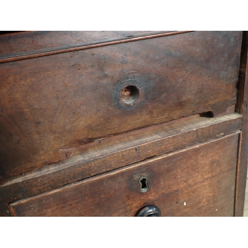 487 - A Victorian mahogany Kneehole Desk fitted nine drawers mounted on bun feet 4ft 3in W x 2ft 9in H