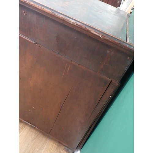 487 - A Victorian mahogany Kneehole Desk fitted nine drawers mounted on bun feet 4ft 3in W x 2ft 9in H