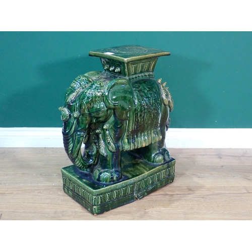 497 - A green glazed Majolica Elephant Garden Seat 1ft 10in H x 1ft 6in L