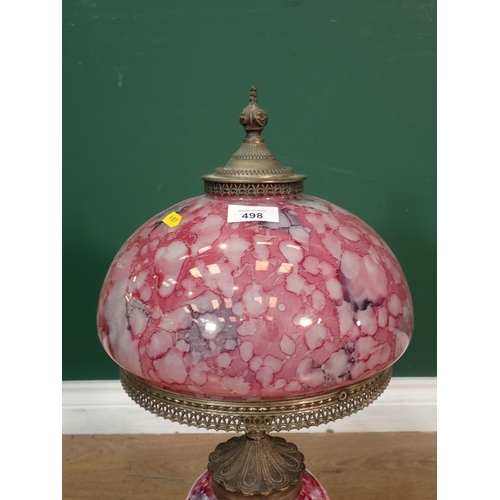 498 - A pink glass Table Lamp and shade on brass base 1ft 11in H, failed PAT, faulty flex