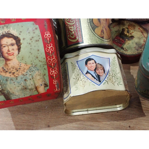 505 - A box of Tins including Queen Elizabeth II Coronation, Coke Lunch Box, Charles and Diana Wedding, et... 