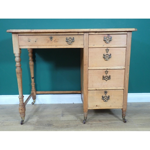 517 - A Victorian pine Desk with leather inset writing surface fitted five drawers on turned supports 3ft ... 