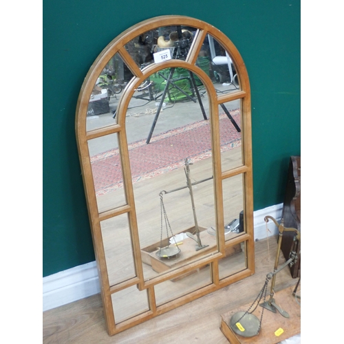 525 - An arched Wall Mirror, oak Pipe Rack and a set of Scales