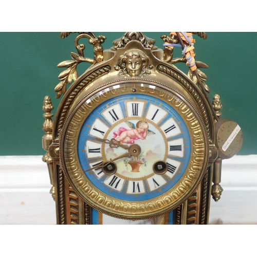 533 - A 19th Century Sevres style porcelain and brass Mantel Clock with blue panels  painted with cherubs ... 