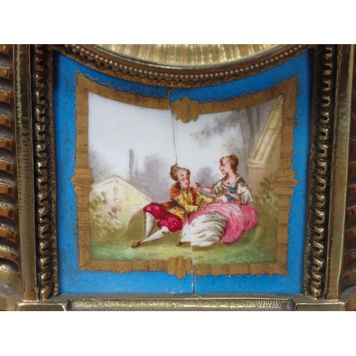 533 - A 19th Century Sevres style porcelain and brass Mantel Clock with blue panels  painted with cherubs ... 