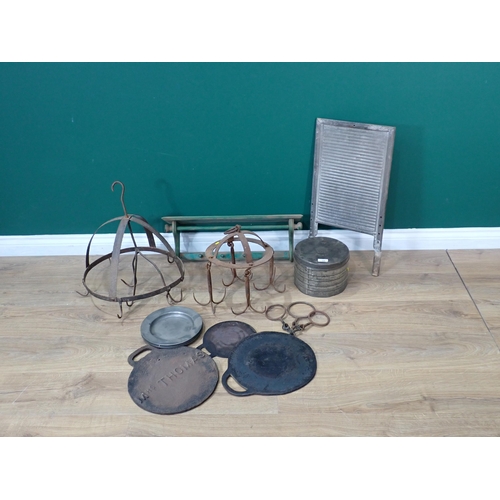 54 - Three cast iron Cooking Pans, two wrought iron Game Hangers, Tin, metal Washboard and Kitchen Roll H... 