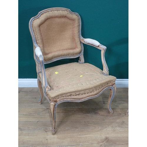 550 - A pair of antique French painted Elbow Chairs in need of reupholstery