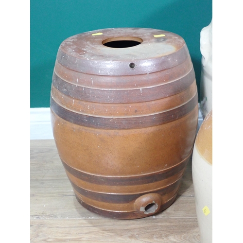 555 - A glazed Butter Barrel, a ceramic Water Purifier, two stoneware Barrels, a large stoneware Bowl and ... 