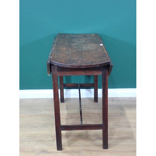 557 - An antique oak oak oval dropleaf Dining Table mounted on square cut supports 3ft 9in W x 2ft 6in H