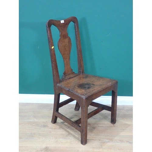 559 - An 18th Century oak Single Chair with vase back