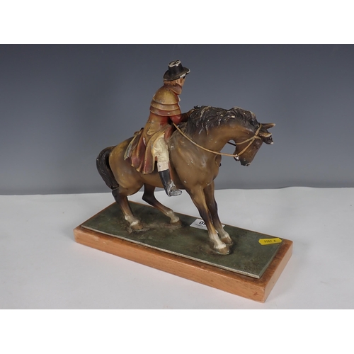 560 - An Austrian painted metal Figure of a Highwayman 9in H