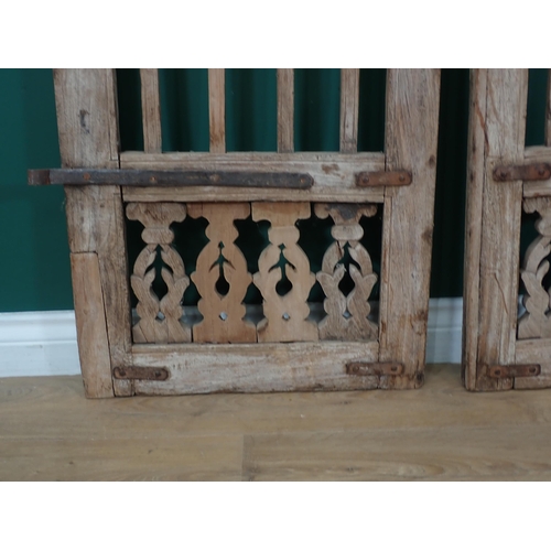 563 - A pair of hardwood Garden Gates with carved bird design, each 3ft 10in H x 1ft 8in W