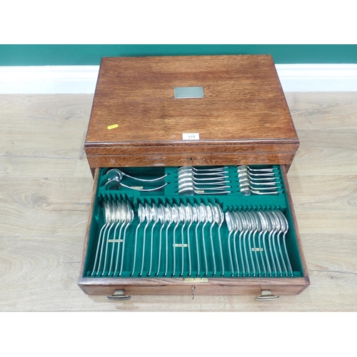 579 - An oak Canteen of plated Cutlery fitted single drawer with silver engraved plaque 1ft 8in W x 8in H