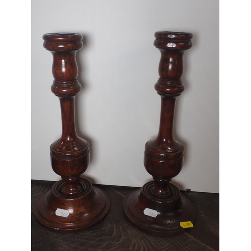 596 - A pair of silver plated Candlesticks bearing maker's mark, 10in H, a plated Bottle Holder with soda ... 