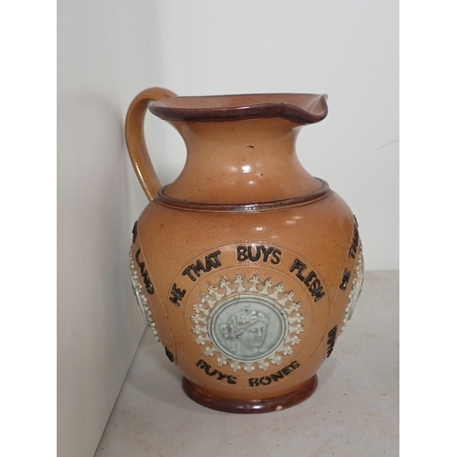 605 - A Doulton Lambeth stoneware domed Chamberstick, 6 1/2in H, depicting monks, damaged, a Royal Doulton... 