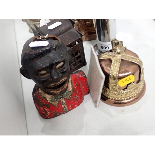 609 - A female figural Money Box, a Bank Money Box and a collection of various other Money Boxes