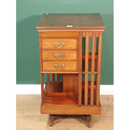 61 - An Edwardian walnut revolving Bookcase fitted three drawers 2ft 9in H x 1ft 6in W