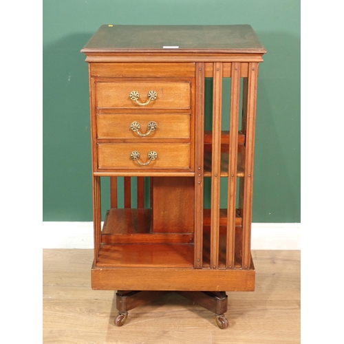 61 - An Edwardian walnut revolving Bookcase fitted three drawers 2ft 9in H x 1ft 6in W