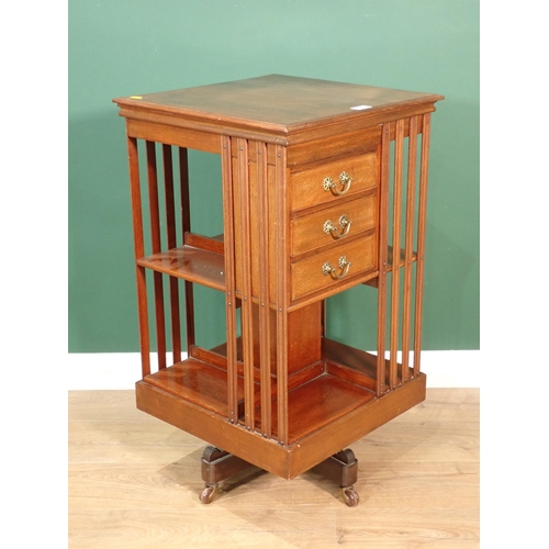 61 - An Edwardian walnut revolving Bookcase fitted three drawers 2ft 9in H x 1ft 6in W