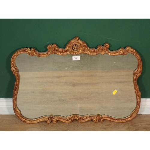 62 - A gilt framed Wall Mirror with leafage and scroll design 2ft 3in W x 1ft 8in H