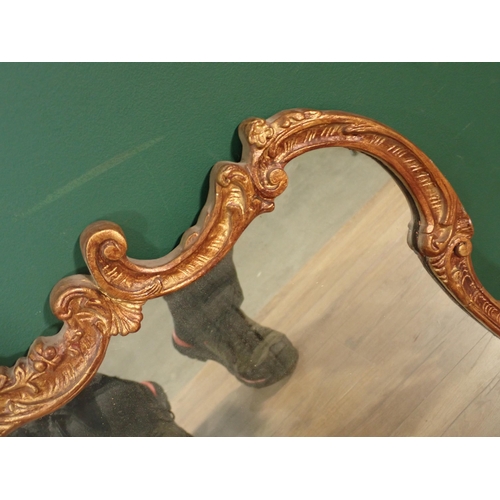 62 - A gilt framed Wall Mirror with leafage and scroll design 2ft 3in W x 1ft 8in H