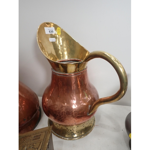 630 - A quantity of copper and brassware including two Jugs, a Kettle, a Candle Box, a Crumb Scoop and Bru... 