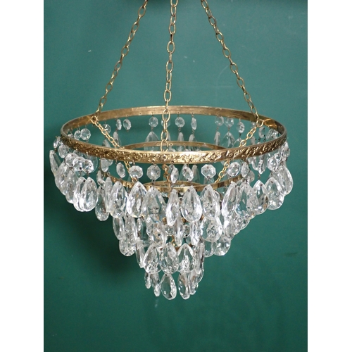 637 - A pair of glass four-branch Candelabra and a brass and glass graduated Light Fitting