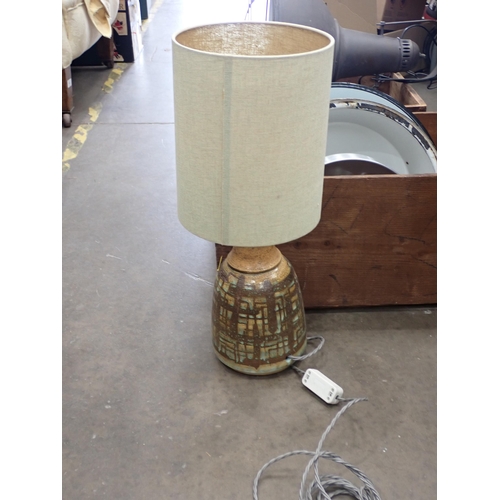 638 - An industrial style Lamp, a pottery Table Lamp and four industrial type Light Shades, passed PAT