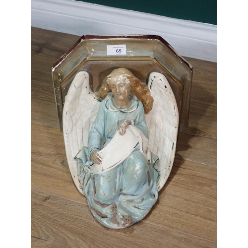 65 - An antique painted plaster Wall Bracket supported by an angel 1ft 3in H x 1ft W